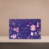 Mylee Lashes Advent calendar containing 12 nail products and is presented in a navy blue box with Christmas inspired illustrations