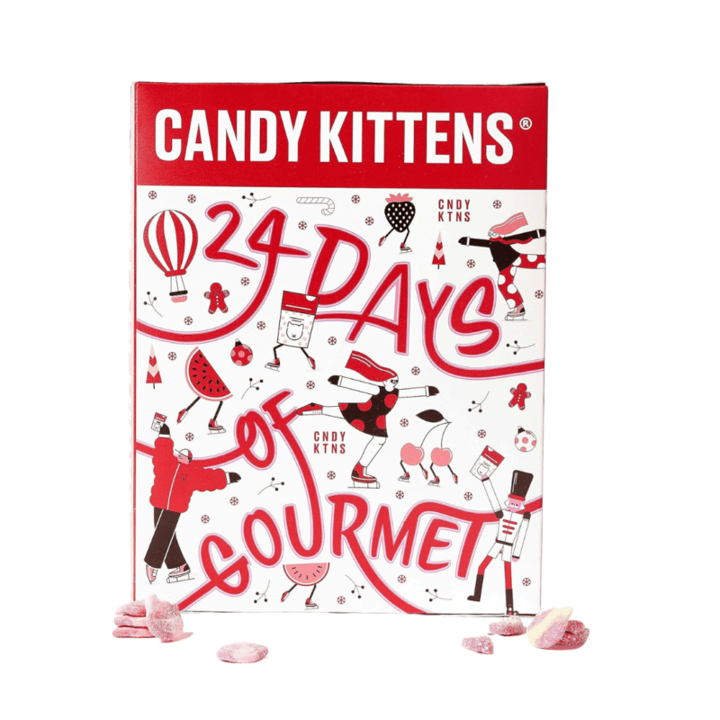 Unleash your taste buds with the Candy Kittens Advent Calendar 2023 including 24 flavorful vegan candies. Presented in a white and red rectangular box with strawberry watermelon and iceskating figures illustrations