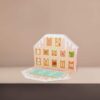 Disney Munchlings advent calendar 2003 includes 12 micro soft toys packaged within a tastefully designed holiday house-shaped box adorned with whimsical sprinkles