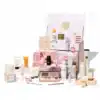Glossybox Advent Calendar 2025 with 27 beauty treats, including 19 full-sized skincare and makeup surprises for beauty enthusiasts.