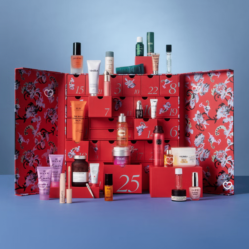 ELLE Beauty 2025 advent calendar presented in a red box with designs by Chopova Lowena and containing beauty products.
