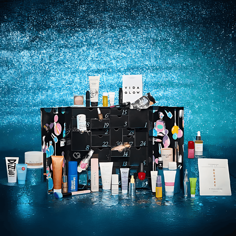 Debenhams Advent Calendar 2025 with 37 beauty treats, 19 full sizes, in a festive red and gold gift box.