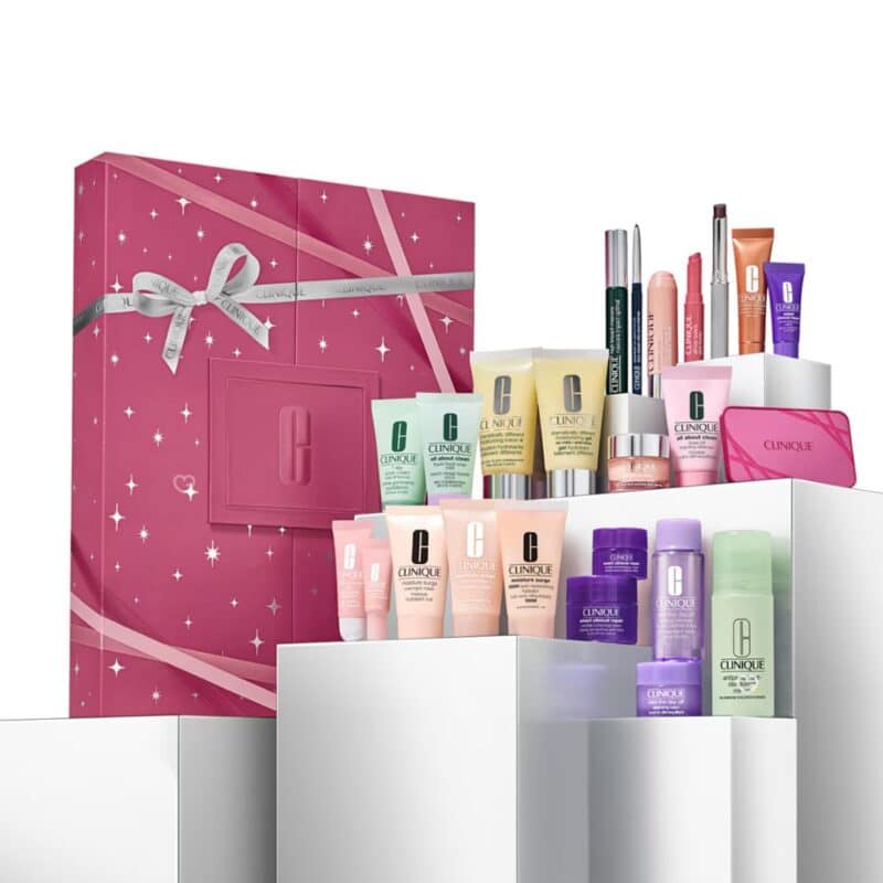 Clinique advent calendar for women with products arranged on white podiums beside the pink gift box