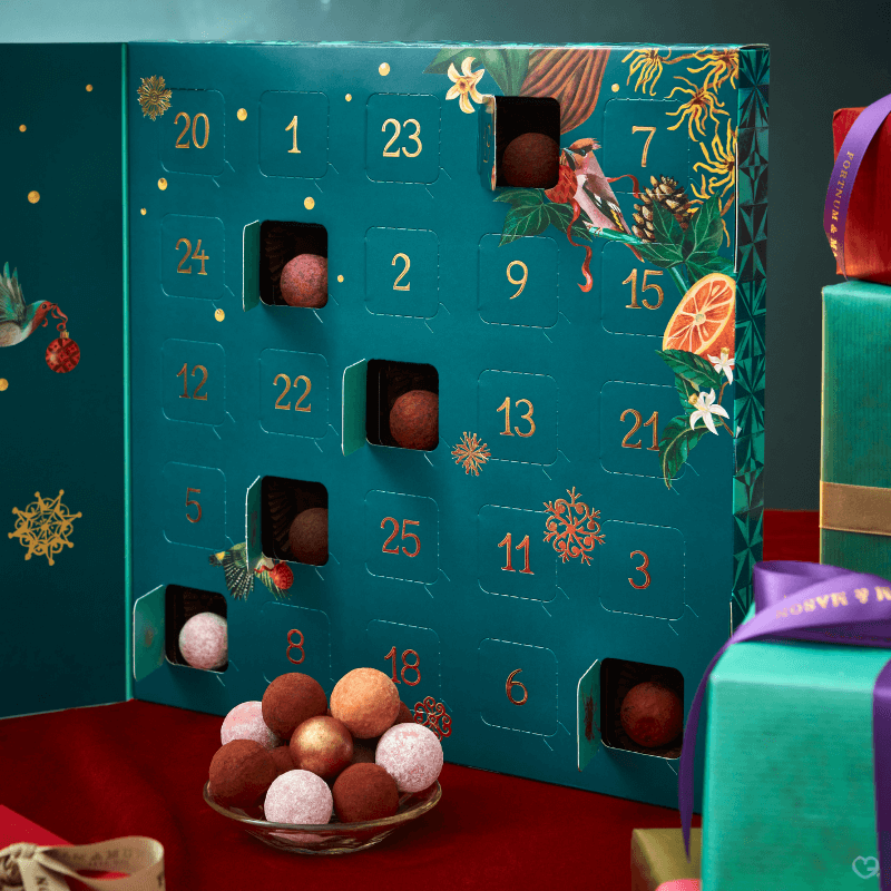 Fortnum’s Chocolate Truffle Advent Calendar 2025 in deep teal blue-green festive box with 25 luxury truffles including exclusives.