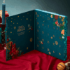 Fortnum’s Chocolate Truffle Advent Calendar 2025 in deep teal blue-green festive box with 25 luxury truffles including exclusives.