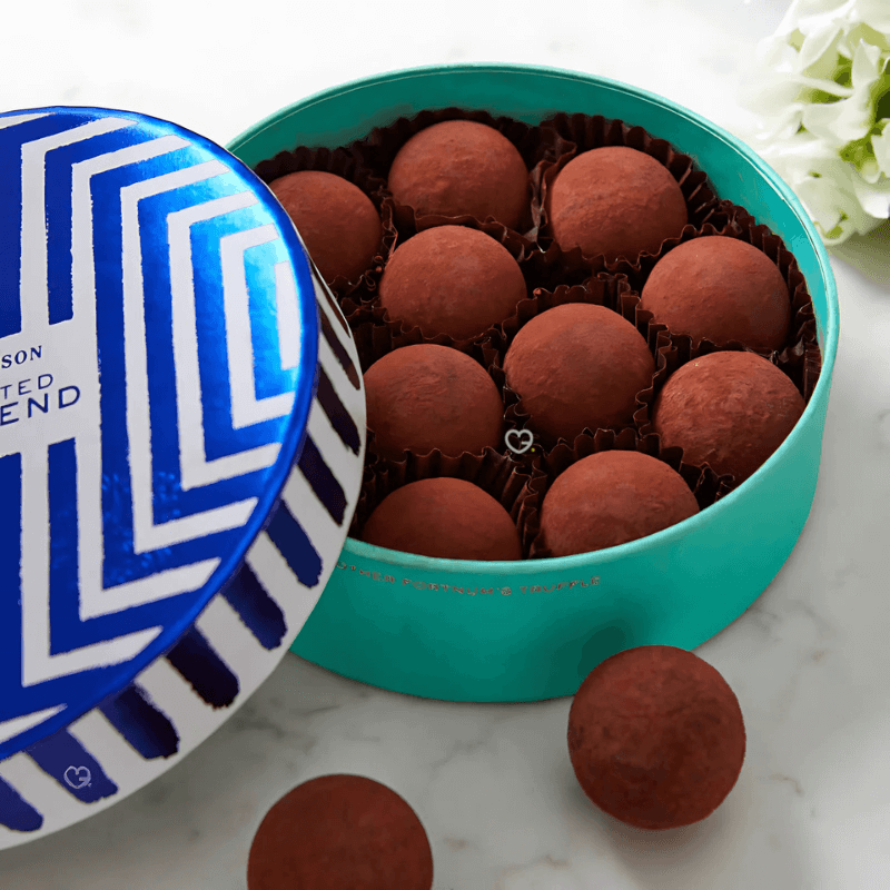 Fortnum’s Chocolate Truffle Advent Calendar 2025 in deep teal blue-green festive box with 25 luxury truffles including exclusives.