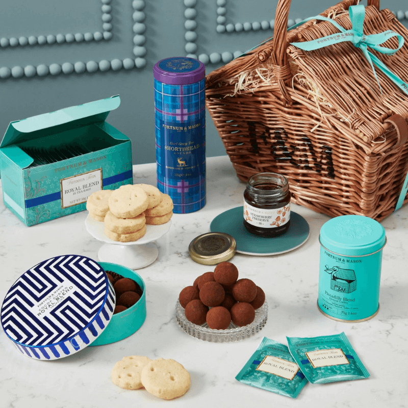 Fortnum’s Chocolate Truffle Advent Calendar 2025 in deep teal blue-green festive box with 25 luxury truffles including exclusives.