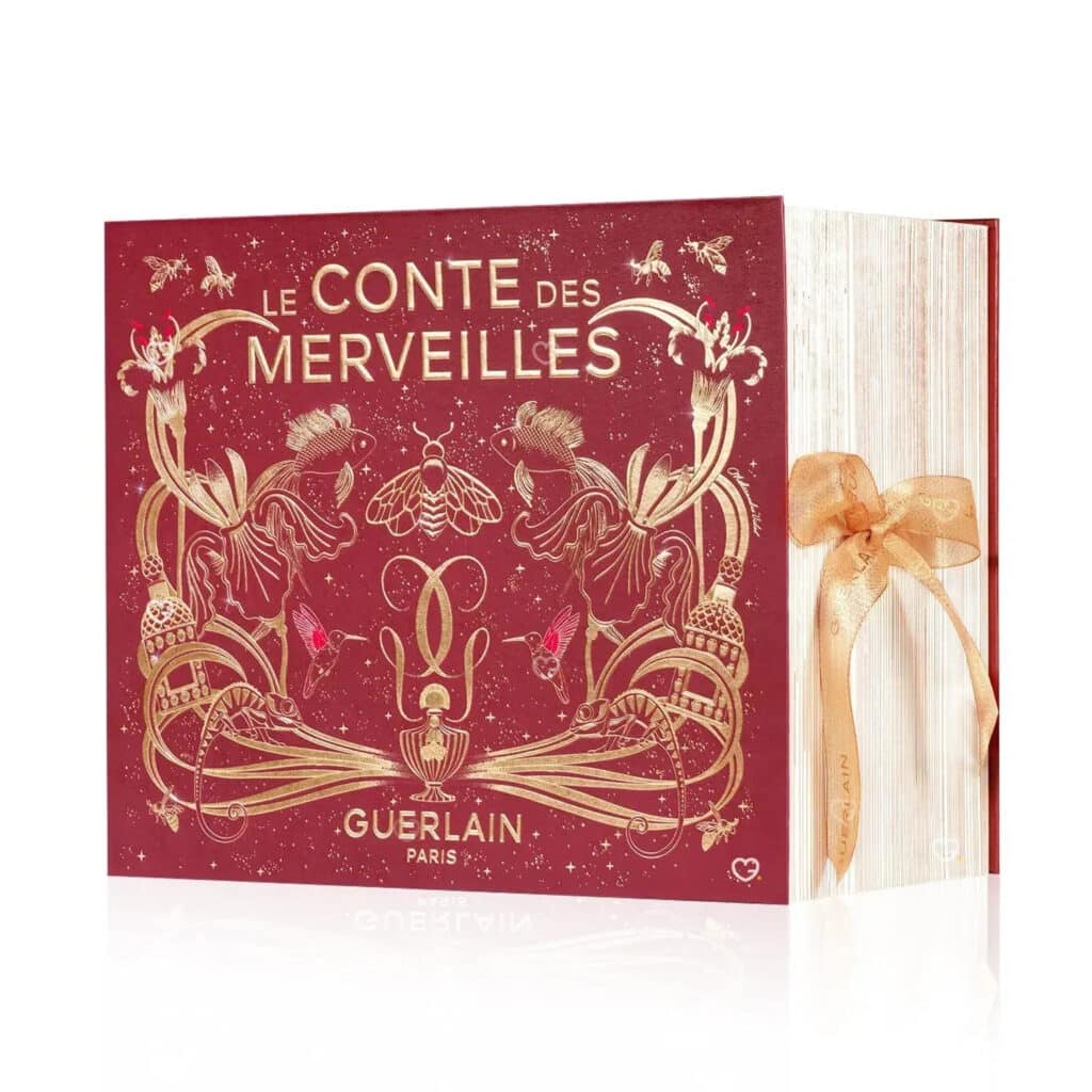 Guerlain Advent Calendar 2025 in gold and red design featuring 25 luxury mini perfumes, skincare, makeup and candles.