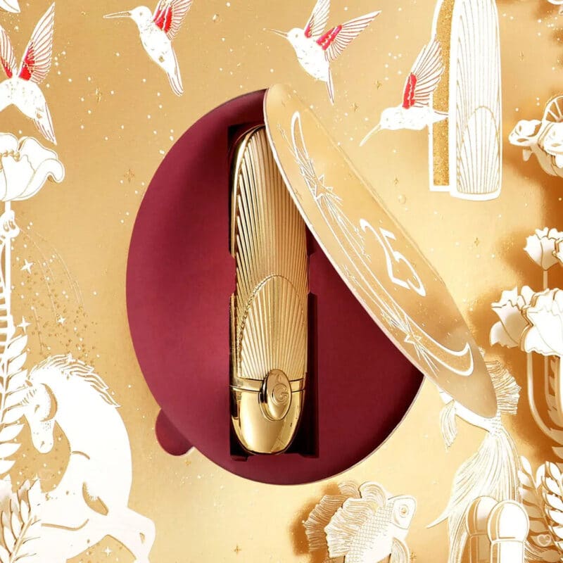 Guerlain Advent Calendar 2025 in gold and red design featuring 25 luxury mini perfumes, skincare, makeup and candles.