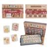 Full contents of the Disney Mystery Pin Advent Calendar 2026: oven case, baking-tray display board and enamel pin badges