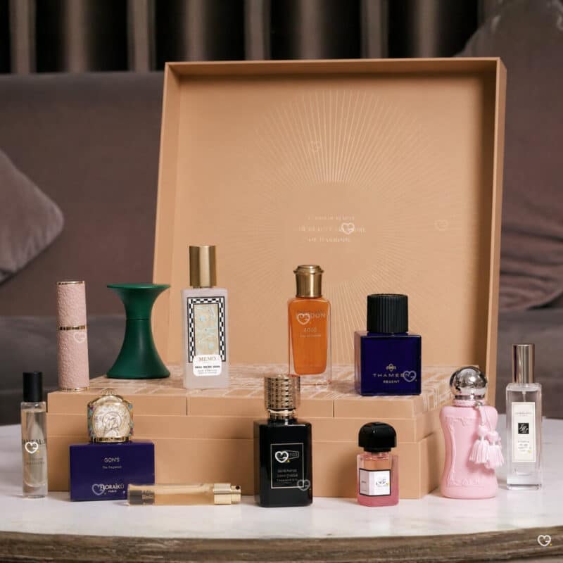 Harrods Fragrance Advent Calendar 2026 open on a mauve sofa