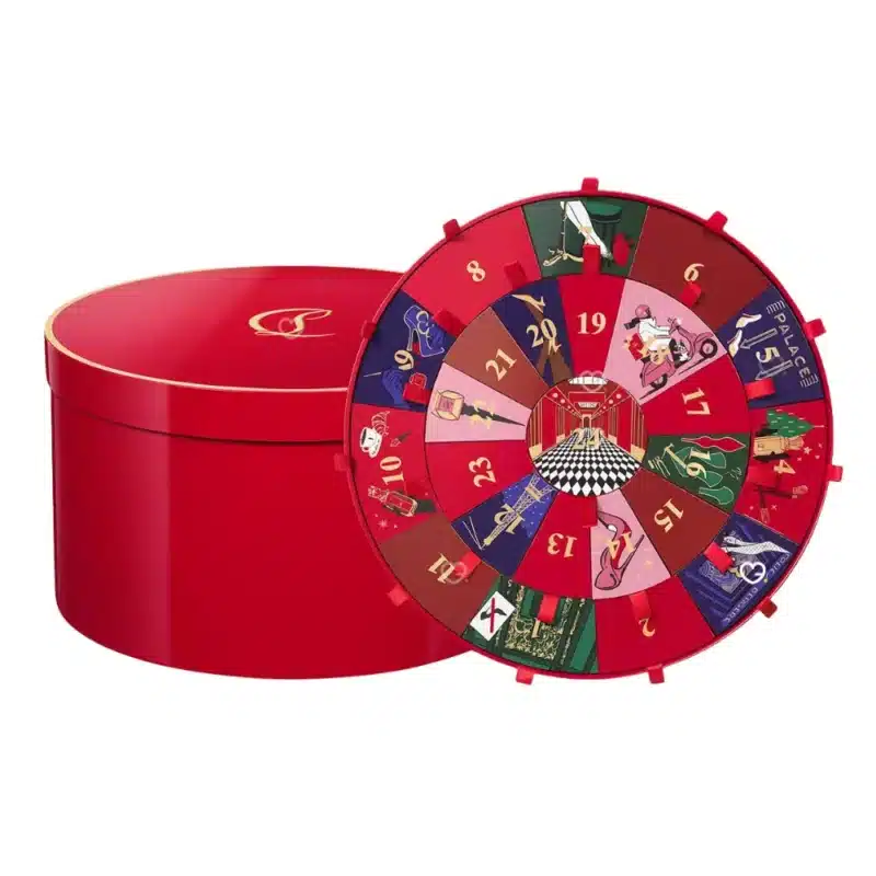 Christian Louboutin Advent Calendar 2025 with 24 luxury beauty treats including perfumes, lipsticks, nail polish and charms for affluent beauty lovers.
