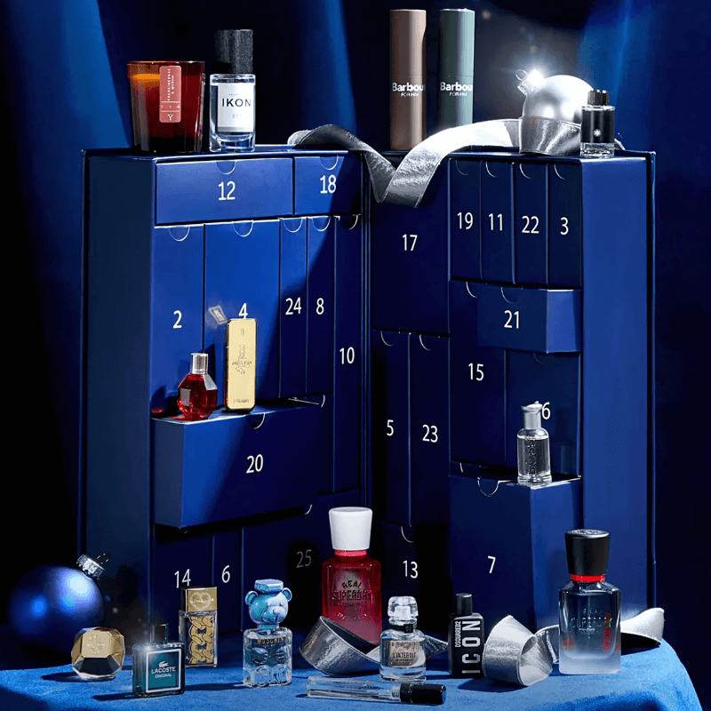 The Fragrance Shop Advent Calendar 2025 in festive blue box with 25 luxury mini perfumes and a gift voucher.