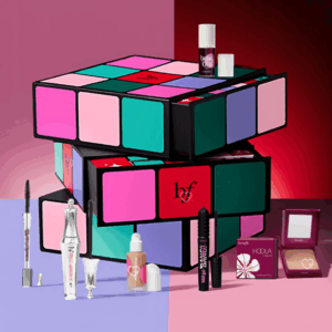 2025 benefit advent calendar filled with 24 beauty favorites like Bronzer, mascara, blush.. in a design box The Glam Cube