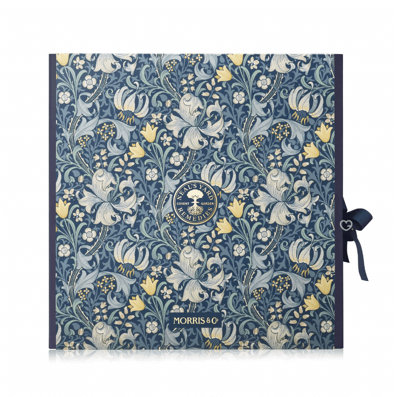 Neal's Yard Remedies Advent Calendar 2025 in blue festive box with 24 organic beauty treats including full-size skincare icons.