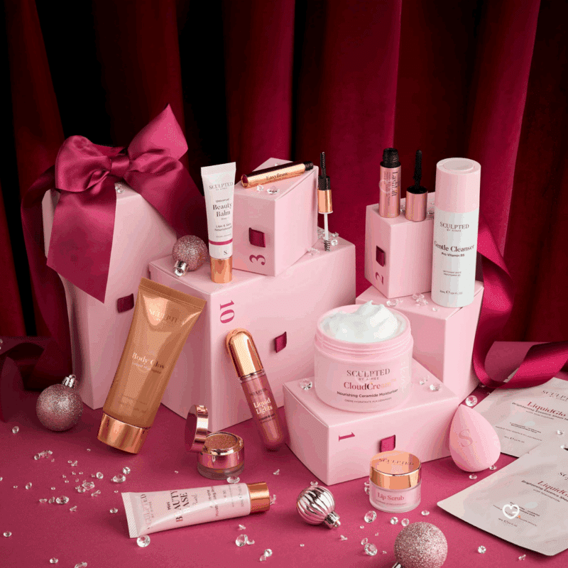 Sculpted By Aimee Advent Calendar 2025 with 12 beauty treats including 8 full-sized and 5 exclusive skincare and makeup products for women.