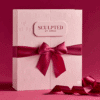 Sculpted By Aimee Advent Calendar 2025 with 12 beauty treats including 8 full-sized and 5 exclusive skincare and makeup products for women.