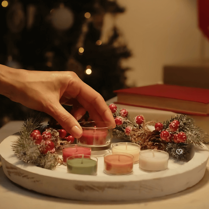 Yankee Candle Wreath Advent Calendar 2025 with 24 scented tea lights, glass holder and 8 festive fragrances, perfect for Christmas candle lovers.