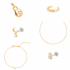 Astrid & Miyu - 24 day Advent Calendar 2025 in gold featuring 23 stackable jewellery pieces, crystal and dome styles, ideal for style-conscious women.
