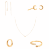 Astrid & Miyu - 24 day Advent Calendar 2025 in gold featuring 23 stackable jewellery pieces, crystal and dome styles, ideal for style-conscious women.