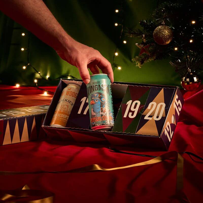BrewDog Advent Calendar 2025 featuring 24 craft beers plus exclusive glass and badge in festive gift box design.