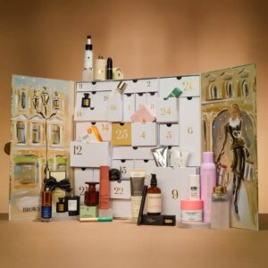 Brown Thomas Advent Calendar 2025 in festive red box with 25 luxury beauty treats from brands like NARS and Jo Malone.