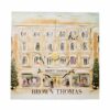 Brown Thomas Advent Calendar 2025 in festive red box with 25 luxury beauty treats from brands like NARS and Jo Malone.