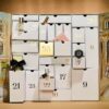 Brown Thomas Advent Calendar 2025 in festive red box with 25 luxury beauty treats from brands like NARS and Jo Malone.