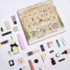 Brown Thomas Advent Calendar 2025 in festive red box with 25 luxury beauty treats from brands like NARS and Jo Malone.