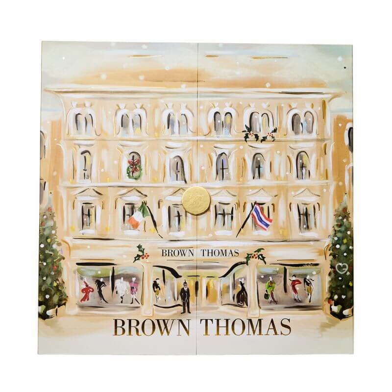 Brown Thomas Advent Calendar 2025 in festive red box with 25 luxury beauty treats from brands like NARS and Jo Malone.
