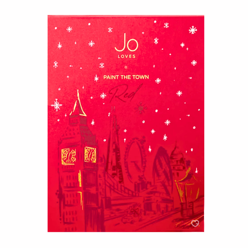 Jo Loves Advent Calendar 2025 in a red festive box with 25 luxury fragrances, candles and body care treats.