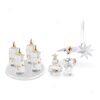Swarovski Advent Calendar 2026 crystal advent candles on their base with the Kris Bear, a crystal tree and a shooting star ornament