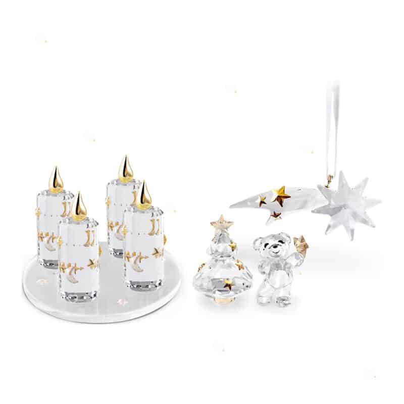 Swarovski Advent Calendar 2026 crystal advent candles on their base with the Kris Bear, a crystal tree and a shooting star ornament