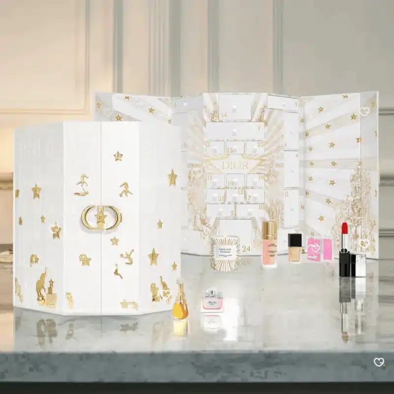 Dior Advent Calendar 2025 with 24 luxury miniatures including fragrances, makeup, skincare and a scented candle, perfect for beauty lovers.