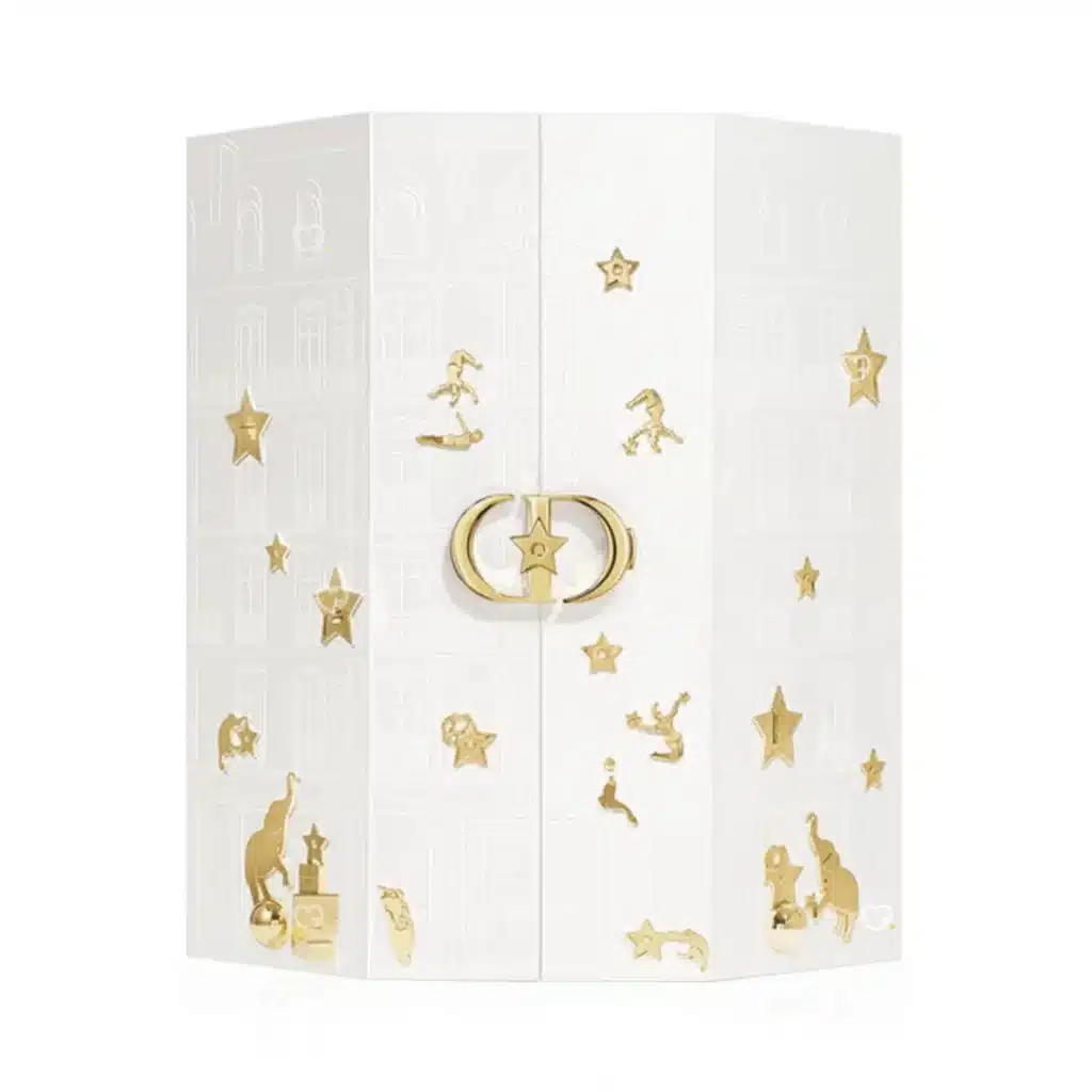 Dior Advent Calendar 2025 with 24 luxury miniatures including fragrances, makeup, skincare and a scented candle, perfect for beauty lovers.