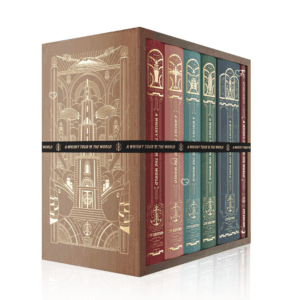 Whisky Tour of Scotland Advent Calendar 2025 is a masterfully designed set, featuring five linen-bound and gold-foiled books within a handmade, engraved wooden bookcase.