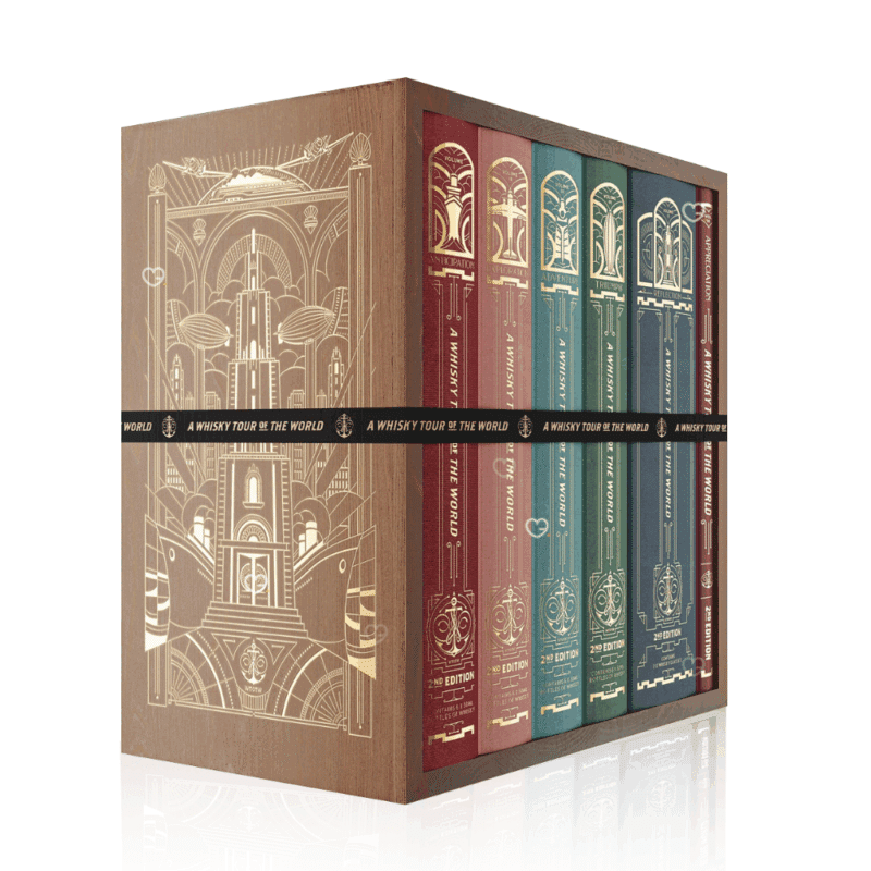 Whisky Tour of Scotland Advent Calendar 2025 is a masterfully designed set, featuring five linen-bound and gold-foiled books within a handmade, engraved wooden bookcase.