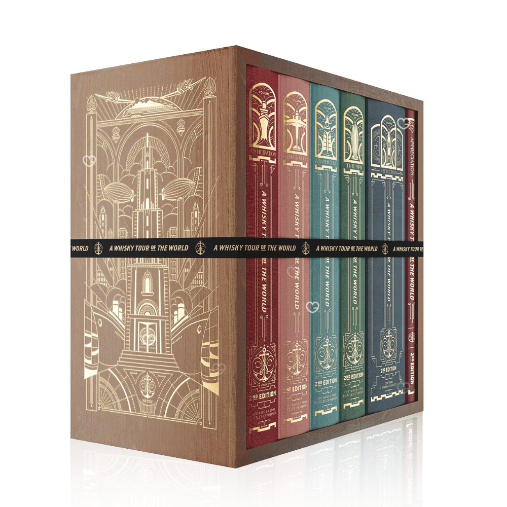 Whisky Tour of Scotland Advent Calendar 2025 is a masterfully designed set, featuring five linen-bound and gold-foiled books within a handmade, engraved wooden bookcase.