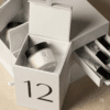 Sentier Advent Calendar 2025 with candle and perfume