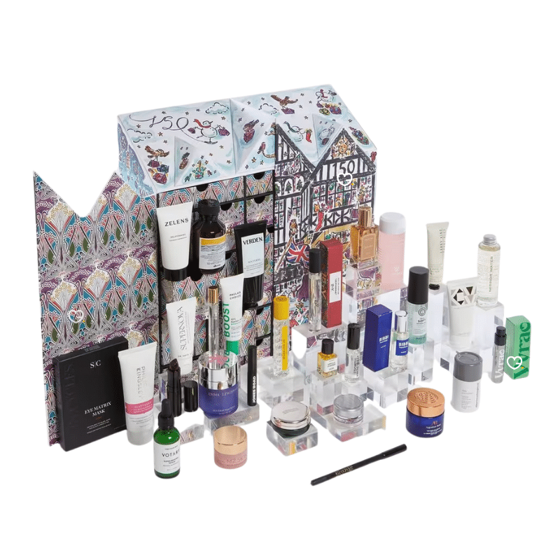 Liberty London Advent Calendar 2025, illustrated in the shape of the iconic Tudor storefront, featuring high-end skincare, makeup, and fragrance products from brands like Le Labo, Augustinus Bader, and Sisley.