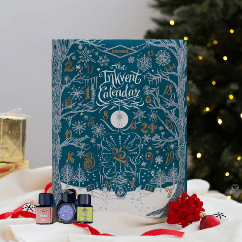 Diamine Inkvent Advent Calendar 2025 with 24 mini 12ml inks and one 30ml bottle, a festive collectible for fountain pen lovers.