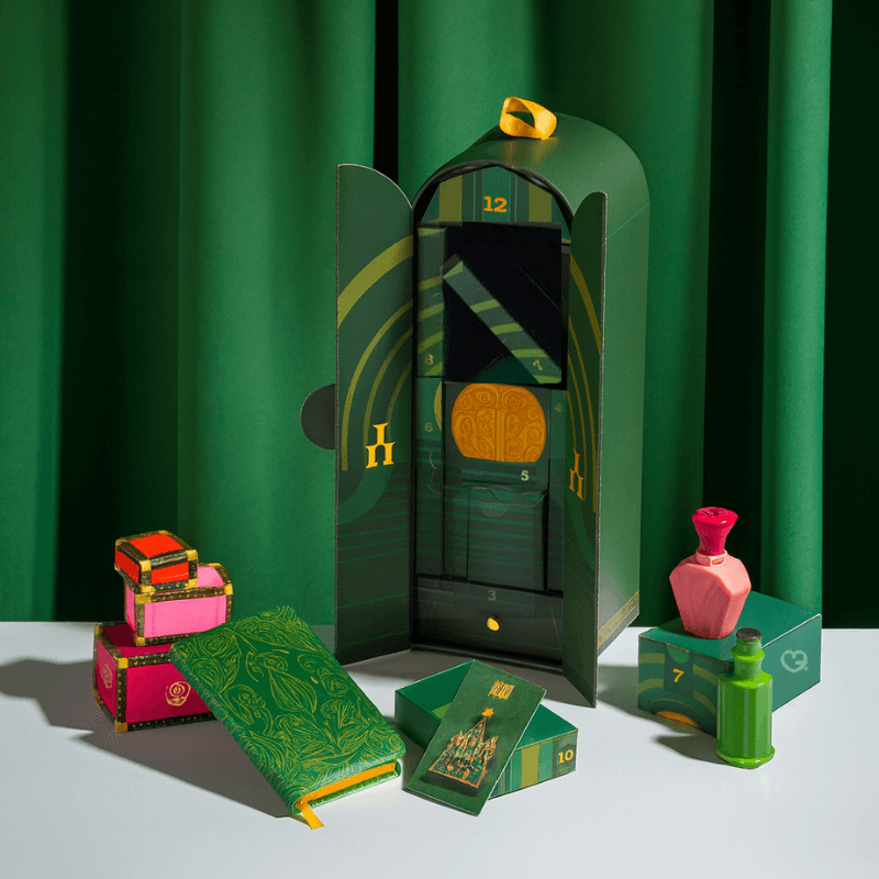 Wicked Premium Advent Calendar 2025 with 12 exclusive collectibles like salt and pepper set, pen, notebook and bookmark, perfect for adult fans and gift giving.