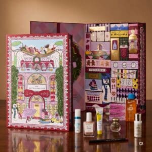 Anthropologie beauty advent calendar 2026, open box showing products and compartments on a wooden surface