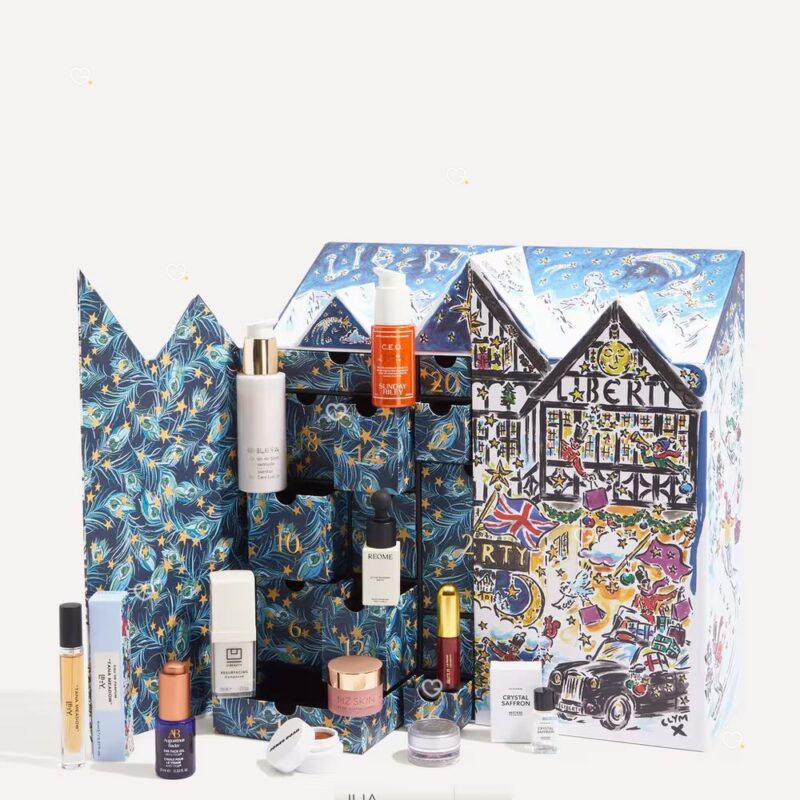 Full contents of the Liberty Beauty Advent Calendar 2026 with numbered drawers open