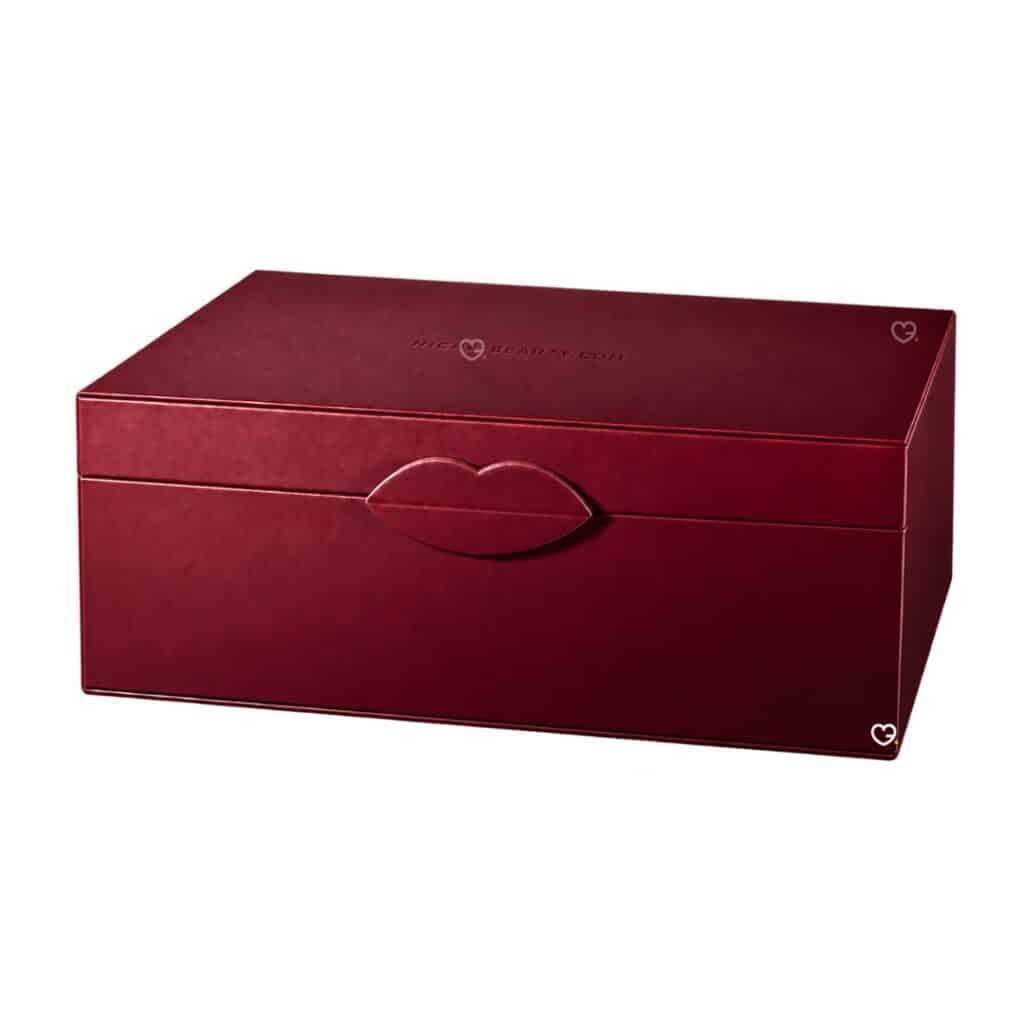 Niche Beauty Advent Calendar 2026 burgundy keepsake box with lip-shaped clasp