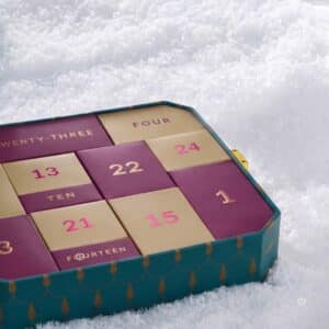 The Perfume Shop Advent Calendar 2026 box in the snow with numbered doors
