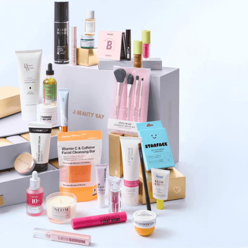 Beauty Bay Advent Calendar 2025 limited edition with 23 full-size and 4 mini makeup, skincare, haircare, and body care treats for beauty enthusiasts.