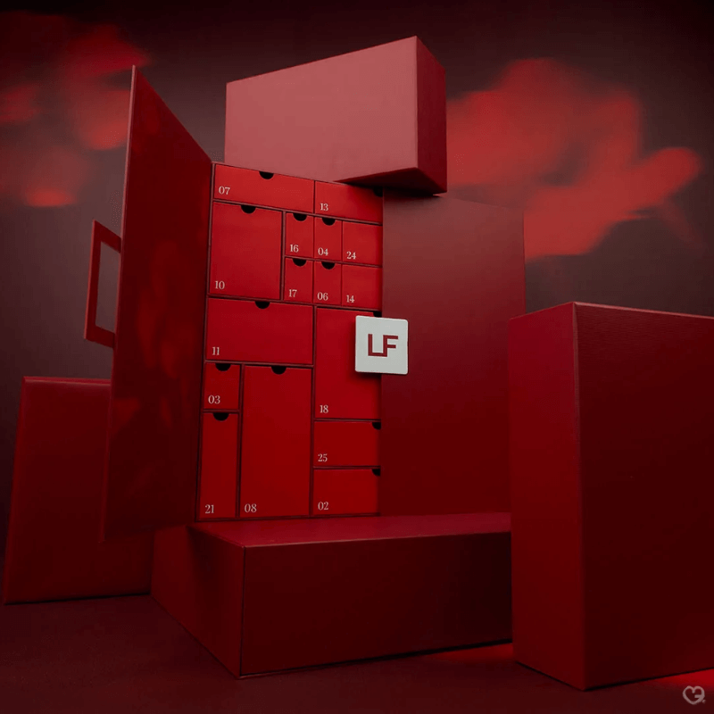 Lookfantastic Fragrance Advent Calendar 2025 in festive red holds 25 luxury minis from YSL, Marc Jacobs, Givenchy and more for beauty lovers.