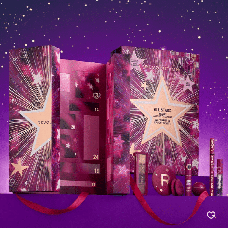 Revolution Advent Calendar 2025 in festive red box with 24 beauty treats for lips, eyes, face and tools.