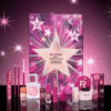 Revolution Advent Calendar 2025 in festive red box with 24 beauty treats for lips, eyes, face and tools.